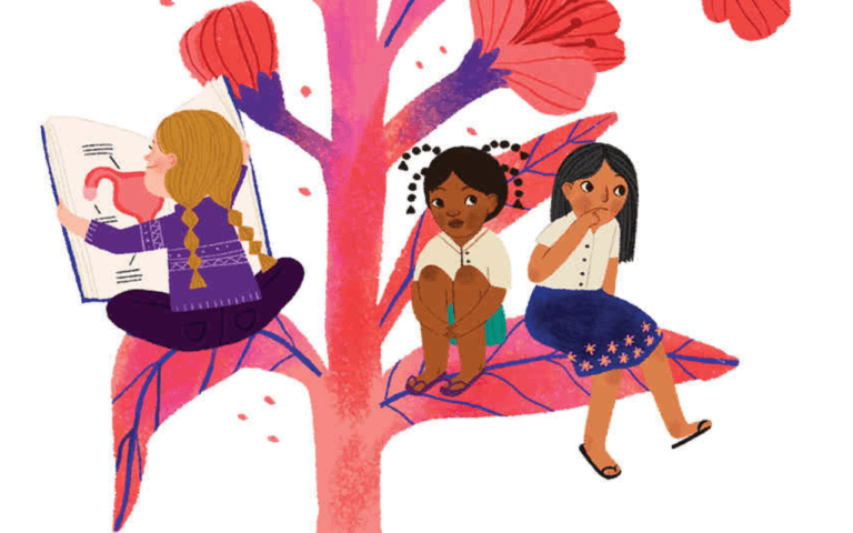Niñas sobre un árbol viendo cuentos sobre Educación Sexual Integral
